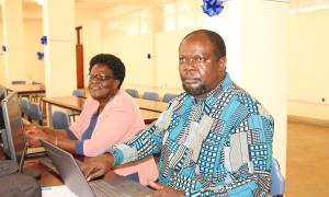 Eria Ntaga, The E-Resource Coordinator and MC for the Open Access celebrations closely following the presentations taking place in Faculty Of Engineering Library on 20th October 2025
