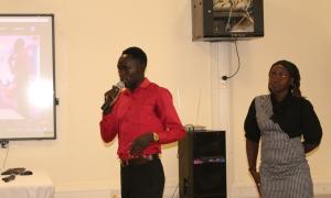 Ayella Patrick Ojok and Nyawere Hedwig students at Buistema University present a mobile app concept that helps farmers identify crop nutrient deficiencies by taking a photo of the plant. This session was held at the Faculty of Engineering Library during the Open Access Week celebrations on 20th October 2025.