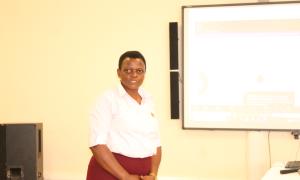 Dr. Fulgensia Kamugisha Mbabazi, Acting Deputy Chief of Graduate Studies, Research and Innovation, delivers her remarks during the celebration of Open Access Week at the Faculty of Engineering Library on 20th October 2025.